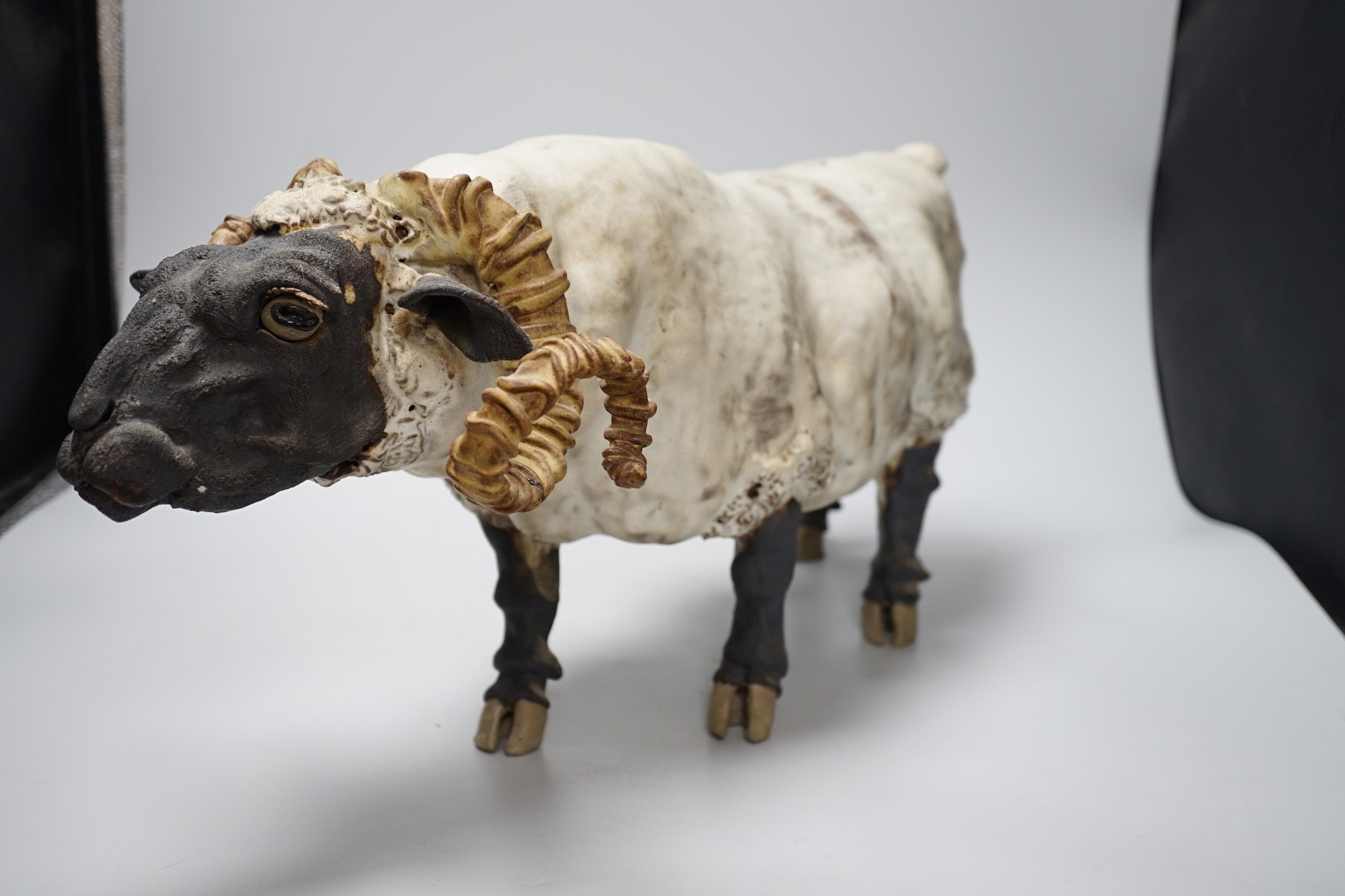 A British studio pottery model of a ram, 56cms long x 28cms high